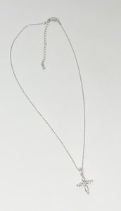 Style by Sophie Swirl Cross Necklace in White Gold Finish
